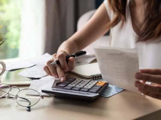 finance woman with calculator