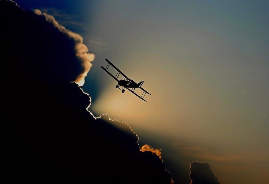 bi-plane in clouds